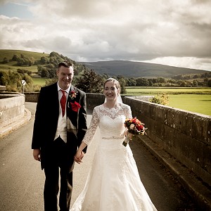 Jenny on the the Bridge wearing her bespoke Amelia Gray Wedding Dress