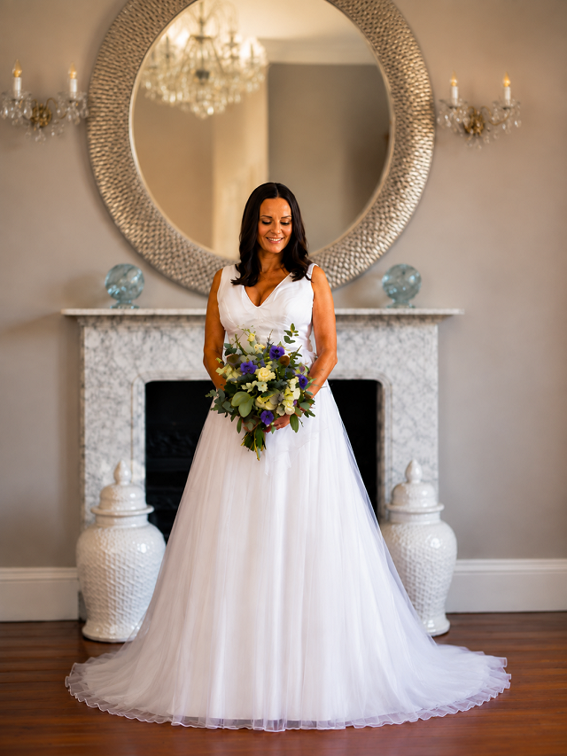 Karen wearing her Bespoke Amelia Gray wedding dress designed by Patricia Barclay